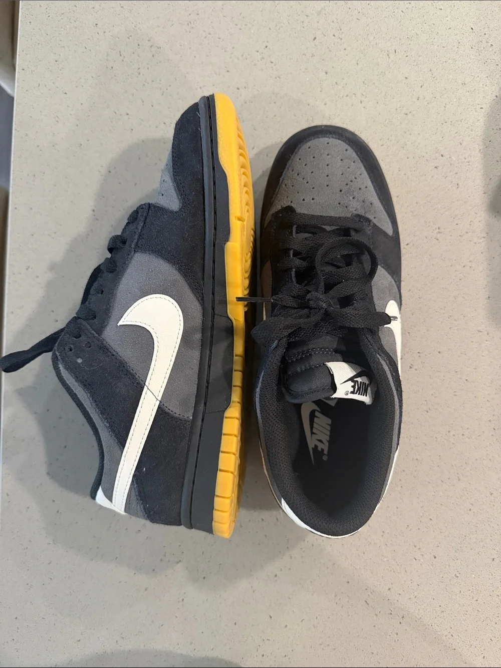 Nike Low-Top Sneakers in Black and Light Gray with White Swoosh